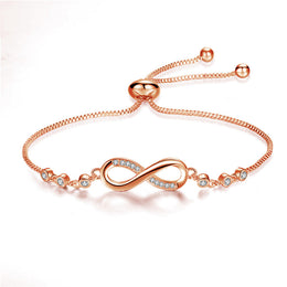 Rose-gold-tone adjustable bracelet with an infinity-shaped centre detail