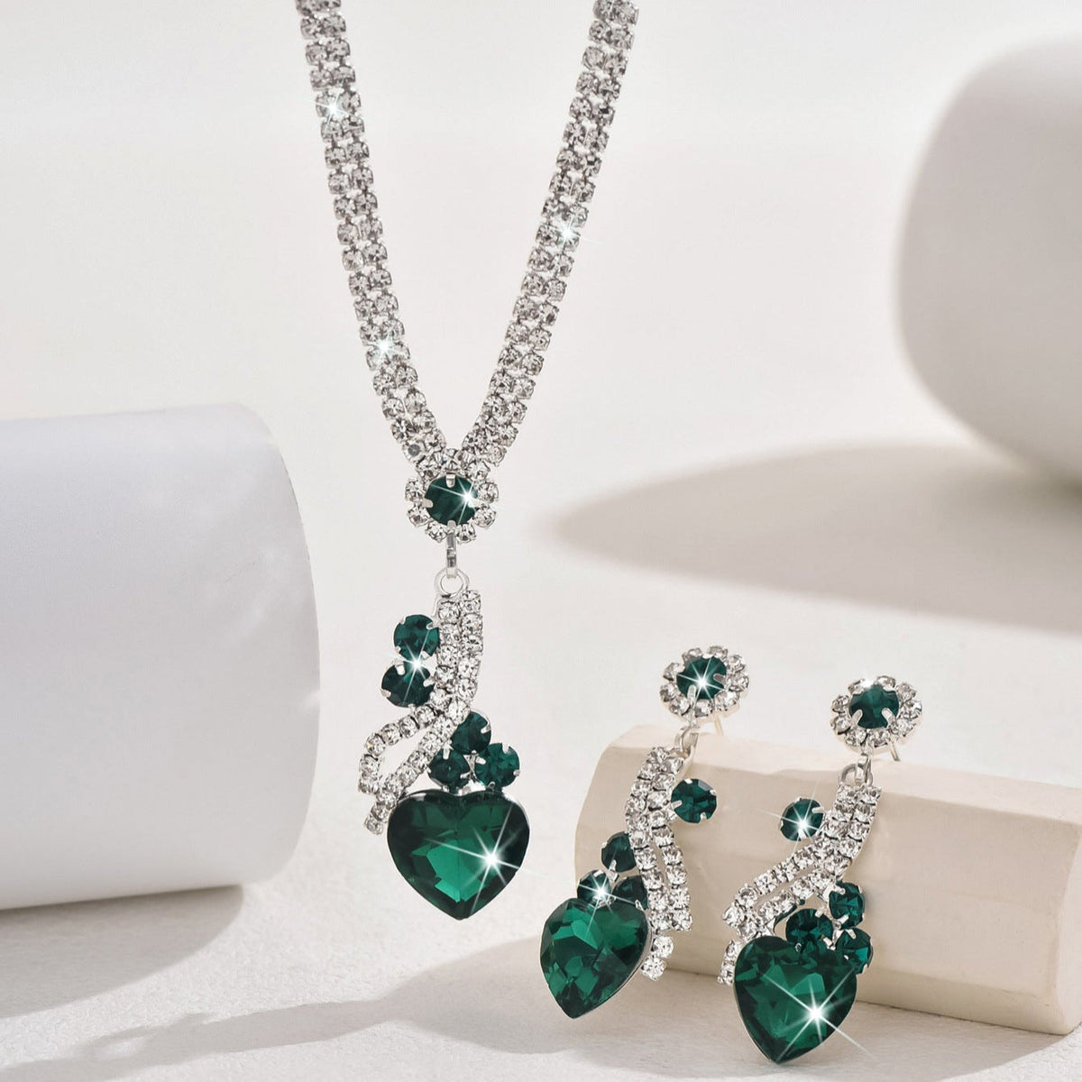 Close-up of the green-detail necklace and earrings