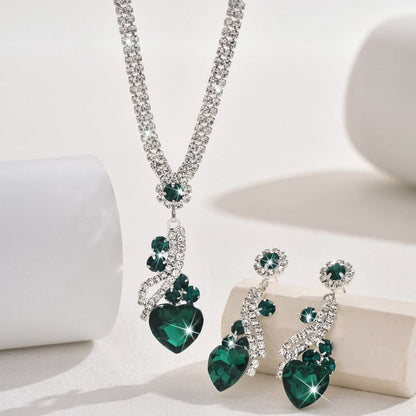 Close-up of the green-detail necklace and earrings